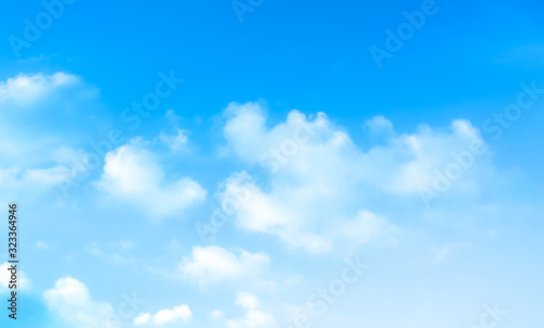 ิblue sky against white floating clouds background