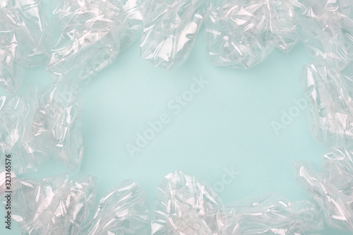 Closeup plastic bottles  recycle material on light blue background concept