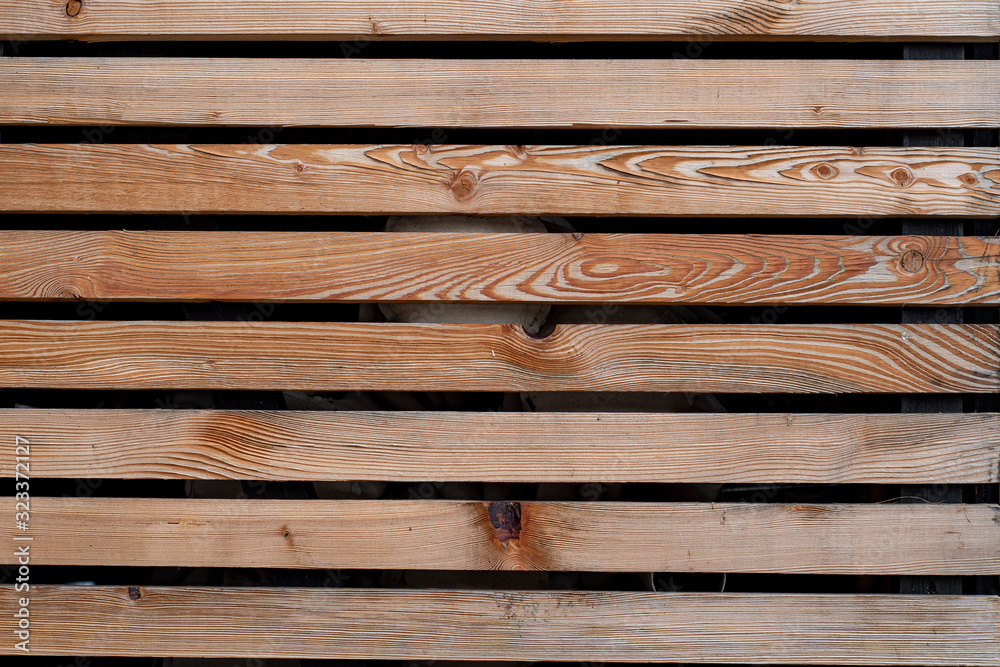Background of wooden planks with large gaps between them. Background of wooden planks with large gaps between them.
