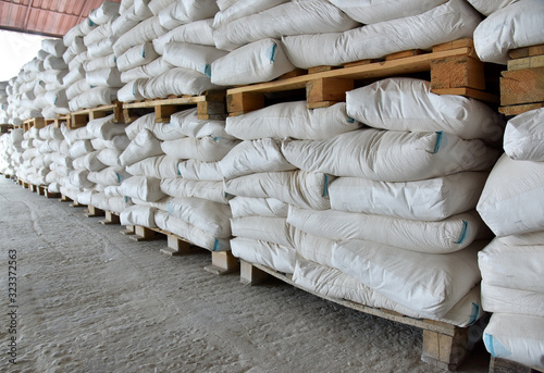 Long rows of pallets with bags.