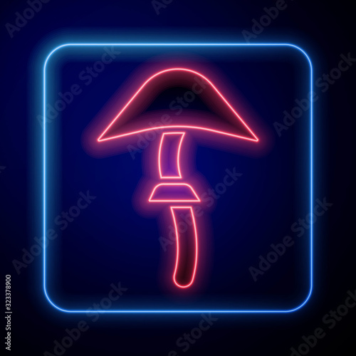 Glowing neon Psilocybin mushroom icon isolated on blue background. Psychedelic hallucination.  Vector Illustration