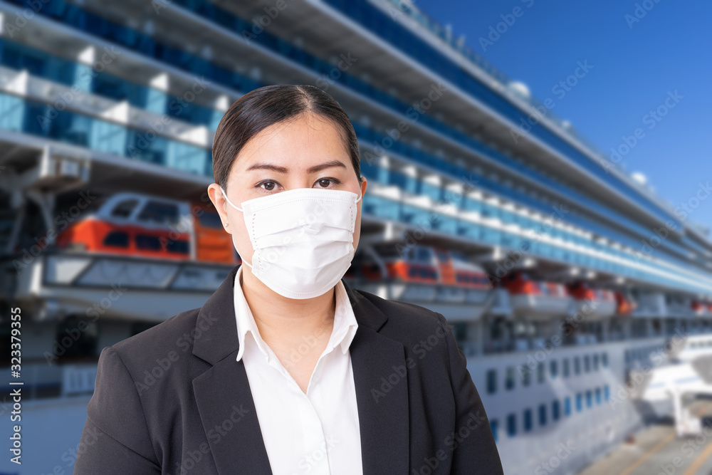 Asian woman wearing surgical mask to prevent flu disease Coronavirus with blurred image of cruise ship