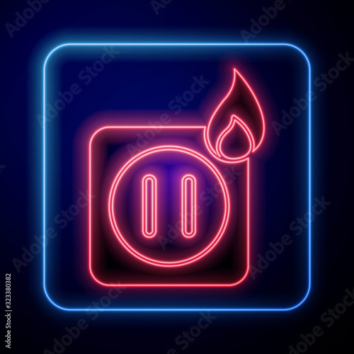 Glowing neon Electric wiring of socket in fire icon isolated on blue background. Electrical safety concept. Plug outlet on fire.  Vector Illustration