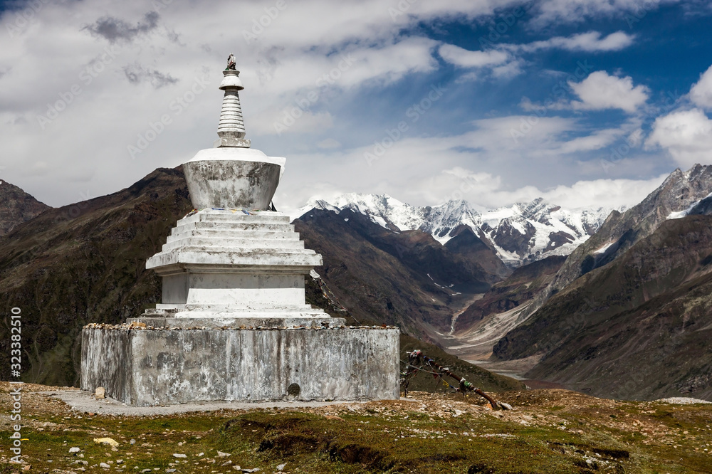 White tibetan buddhist pagoda at the Rohtang pass in Northern India mountains near Manali.