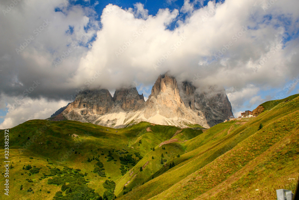 Photograph of the peaks of a cloud-covered mountains