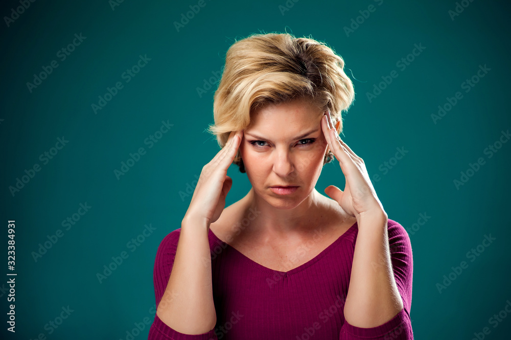 Woman thinking hard about something. People, lifestyle and emoti Woman thinking hard about something. People, lifestyle and emoti