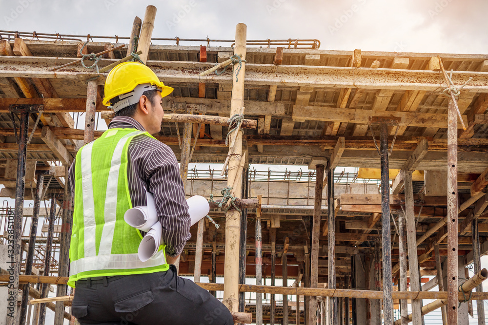 professional engineer worker at the house building construction site professional engineer worker at the house building construction site