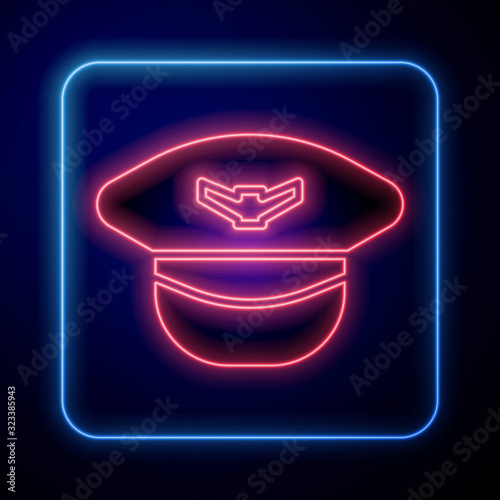 Glowing neon Pilot hat icon isolated on blue background.  Vector Illustration