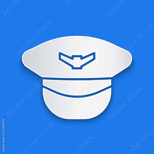 Paper cut Pilot hat icon isolated on blue background. Paper art style. Vector Illustration