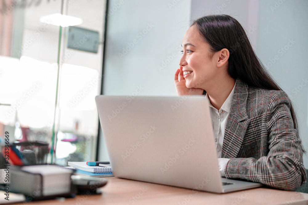 Asian young woman is woking in office Asian young woman is woking in office