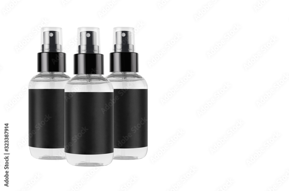Transparent spray bottles for cosmetics product with black blank label isolated on white background, mock up for branding, advertising, design. Transparent spray bottles for cosmetics product with black blank label isolated on white background, mock up for branding, advertising, design.