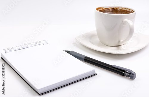 notebook and pencil and coffee