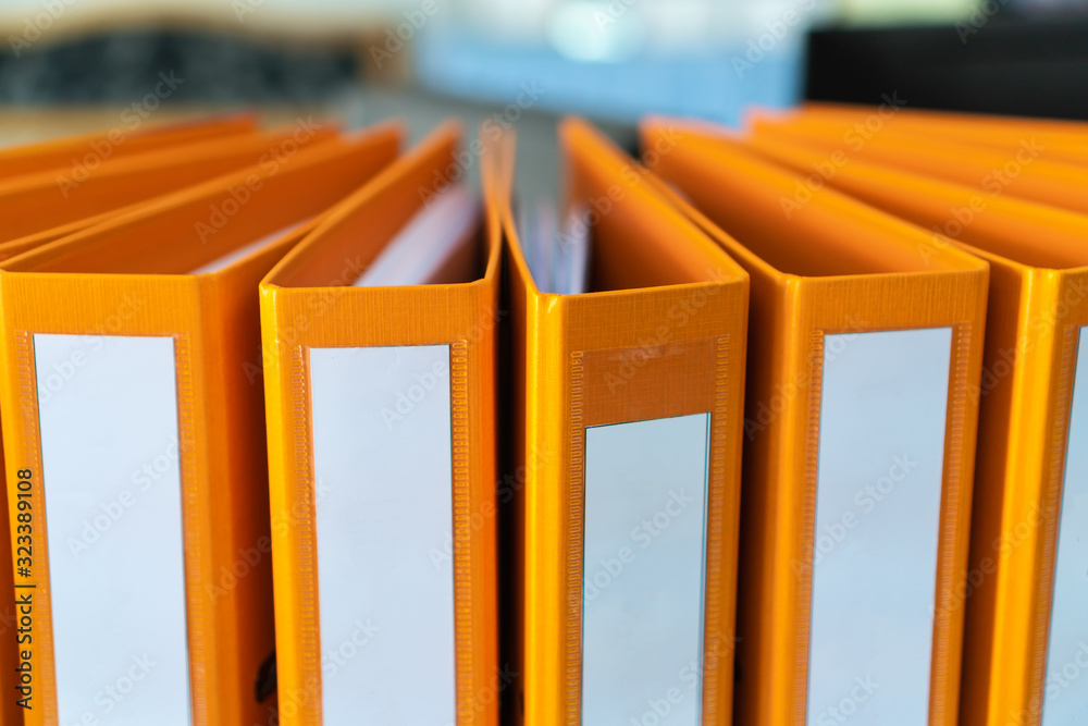 Documents Binder Paper with blank label,Orange Files folder on office