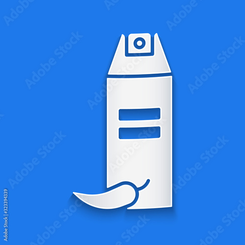 Paper cut Pepper spray icon isolated on blue background. OC gas. Capsicum self defense aerosol. Paper art style. Vector Illustration