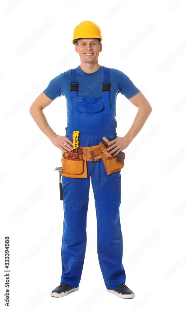 Handsome carpenter with tool belt isolated on white Handsome carpenter with tool belt isolated on white
