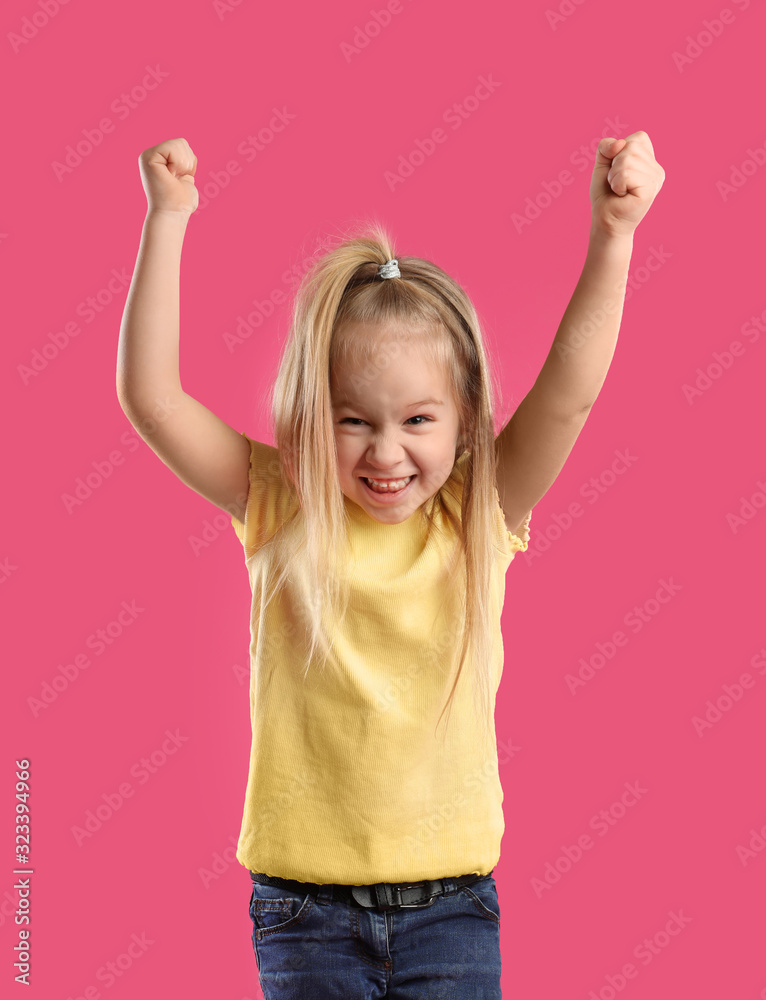 Portrait of excited little girl on pink background Portrait of excited little girl on pink background