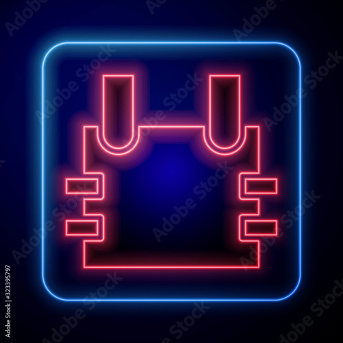 Glowing neon Bulletproof vest for protection from bullets icon isolated on blue background. Body armor sign. Military clothing. Vector Illustration