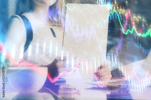 Wallpaper Mural Double exposure of hands making notes with forex chart huds. Stock market concept. Torontodigital.ca
