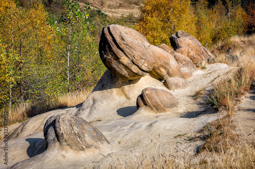 Old trovant -Spectacular rock formations,natural formed living and growing stones,Ulmet, Buzau County, Romania photo