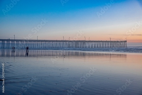 sunset over the wooden pier of Pismo Beach California