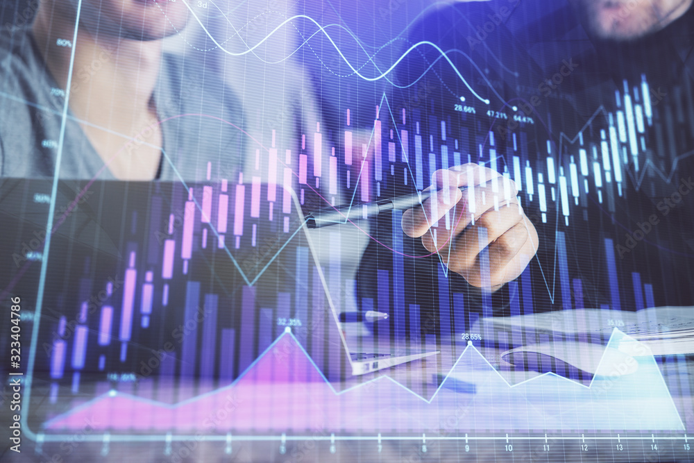 Forex graph with businessman typing on computer in office on background. Concept of analysis. Double exposure. Forex graph with businessman typing on computer in office on background. Concept of analysis. Double exposure.