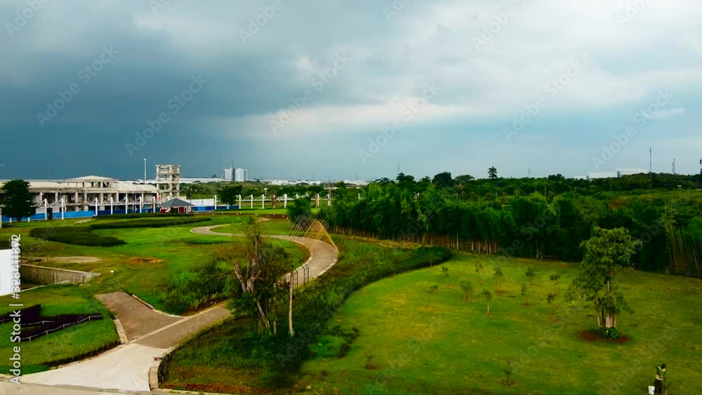 Aerial View or Drone Shot. Beautiful garden view and Green Lake after rain Aerial View or Drone Shot. Beautiful garden view and Green Lake after rain