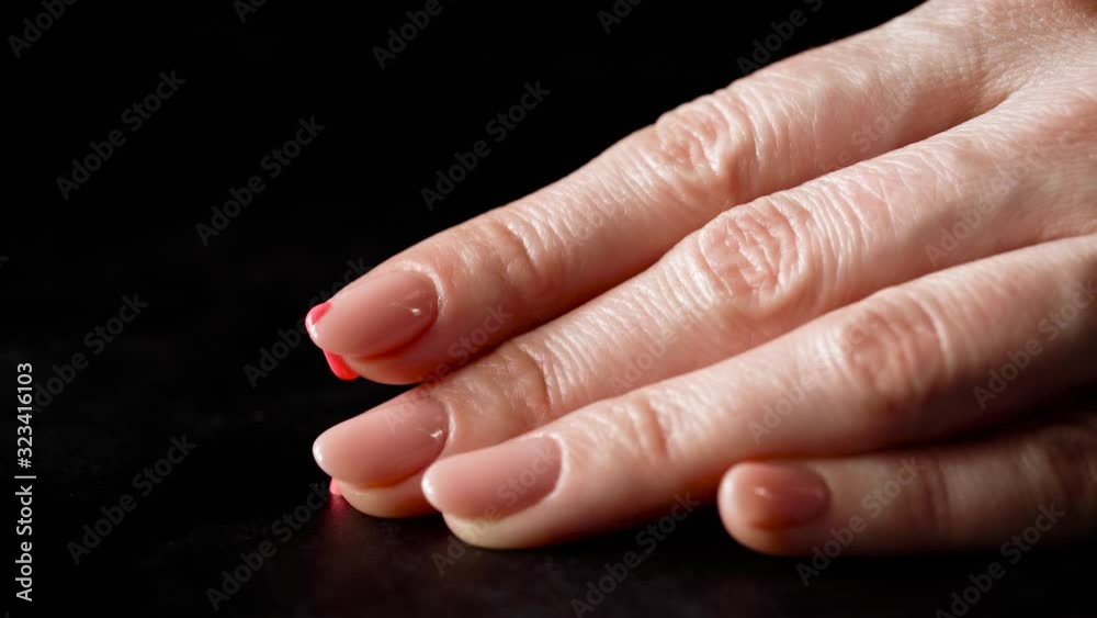 The manicure master can't paint his nails. A drop of nail polish fell past the nail. The manicure master does not properly paint his nails himself. The manicure master can't paint his nails. A drop of nail polish fell past the nail. The manicure master does not properly paint his nails himself.