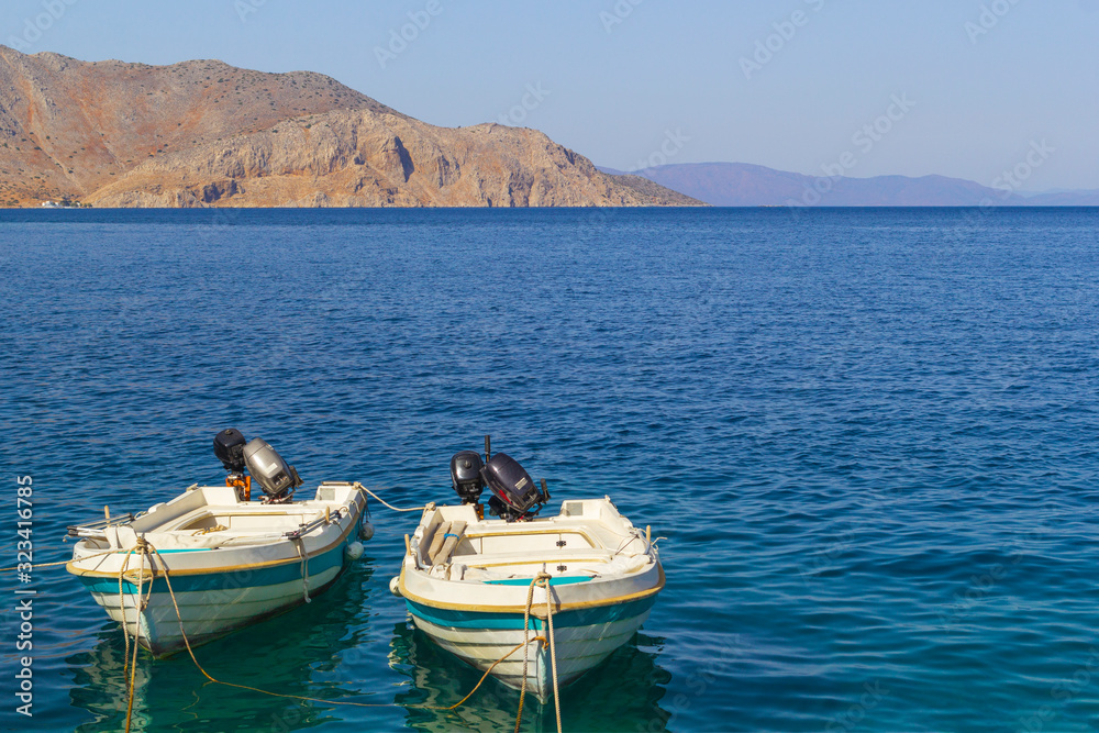 Obraz premium Traditional fishing boats in the aegean sea, Greece.