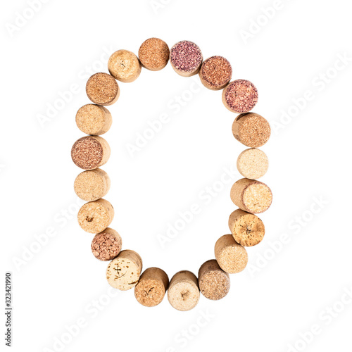 The letter "O" is made of wine corks. Isolated on white background