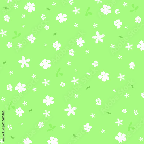 Repeating white flowers and green leaves, various sizes on a gently green background. Female floral seamless pattern. Illustration.