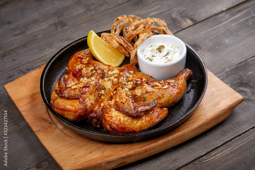 roasted chicken with sauce and lemon roasted chicken with sauce and lemon