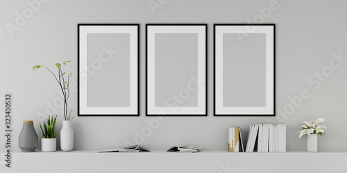 Fototapeta Naklejka Na Ścianę i Meble -  modern living room with sofa and furniture and group of picture frame on the wall. 3d render.