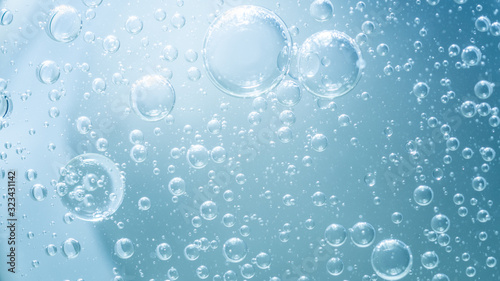 Abstract Blue water bubbles background photo