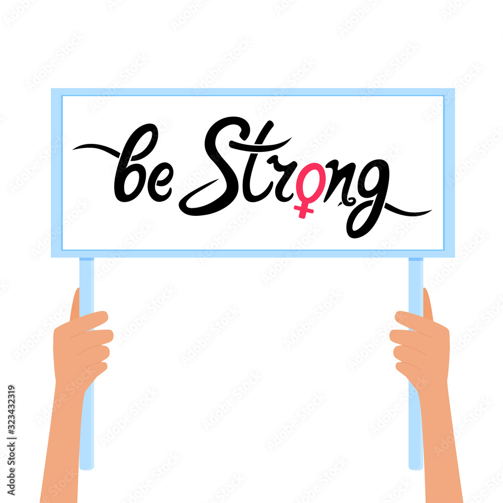 Two hands are holding a banner with handwritten inscription Be strong . Female gender sign. Girl Power, fight, protest, strength, struggle for women's rights. Two hands are holding a banner with handwritten inscription Be strong . Female gender sign. Girl Power, fight, protest, strength, struggle for women's rights.