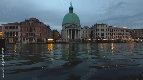 view of san simeone piccolo church and grand canal at evening time photo