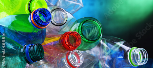 Empty colored carbonated drink bottles. Plastic waste photo