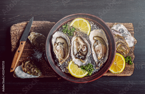 Fresh oysters with lemon ice and white wine.