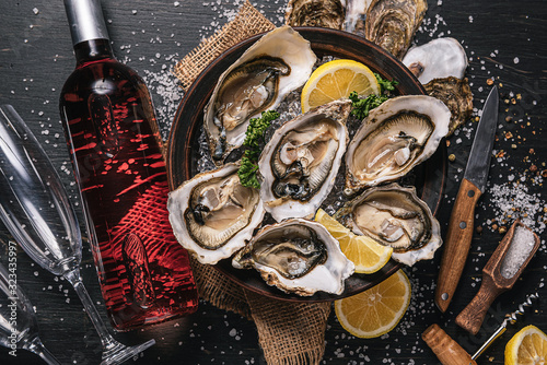 Fresh oysters with lemon ice and white wine.