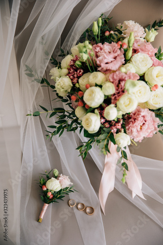 wedding bridal bouquet  rings and groom   s boutonniere