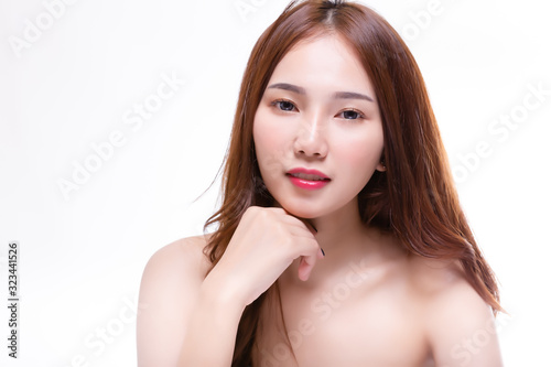 Beauty asian woman has nice face skin and looks healthy skin. Chinese young woman get confident and happy with her beautiful skin. Attractive beautiful girl wear nice contacts lens. Isolated on white