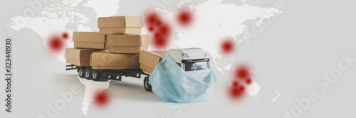 Obraz na płótnie Coronavirus nCoV Chinese infection Danger business of trucking, delivering cargo around world car in mask protection against Virus world map with location China, virus epidemic China Coronavirus