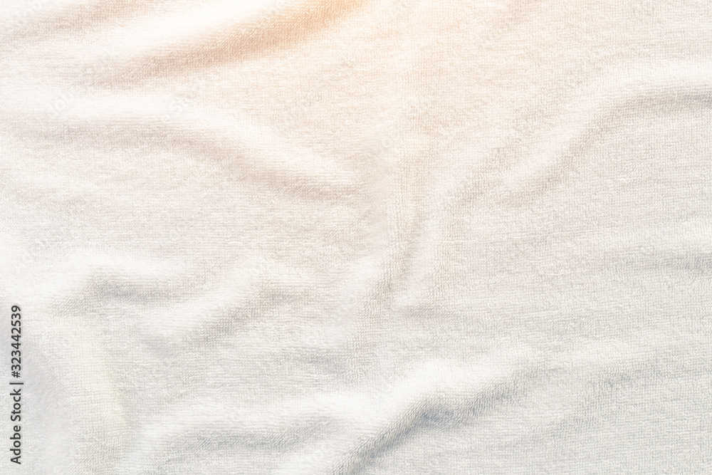 White towel texture for background. That fabric or textile consist of cotton fiber material. Look plush, fluffy, dry, soft and clean. For background about baby, spa, hotel, laundry and hygiene etc. White towel texture for background. That fabric or textile consist of cotton fiber material. Look plush, fluffy, dry, soft and clean. For background about baby, spa, hotel, laundry and hygiene etc.