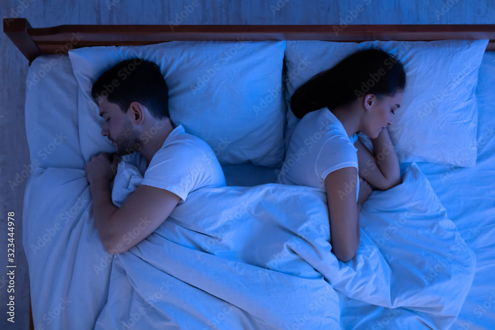 Spouses Sleeping Lying Back To Back In Bed In Bedroom Above View Foto De Stock Adobe Stock 3782