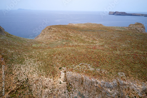 Aeial top view drone shot of Gramvousa island near Crete, Greece. Balos beach. Magical turquoise waters, lagoons, beaches of pure white sand photo