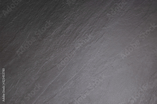 Dark grey stone background texture, natural black stone abstract or dark cement for decoration concept.