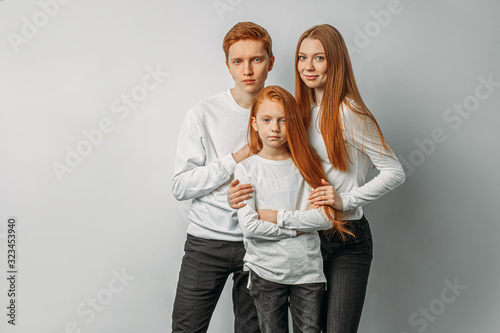 portrait of beautiful caucasian people with unusual hair colour, redhaired people posing at camera isolated over white background. natural ginger hair, red hair, auburn