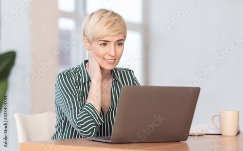 Business Lady Using Laptop Working In Modern Office