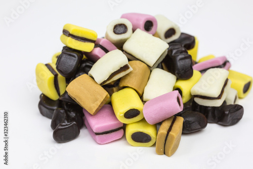 heap of colorful gummy candy and licorice photo