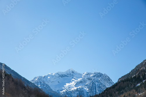 Snow, forest and mountains for a ski typical resort wellness winter vacational © Visualis World