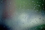 Window glass after heavy rain. Abstract blurred vintage toned background, Selective soft focus